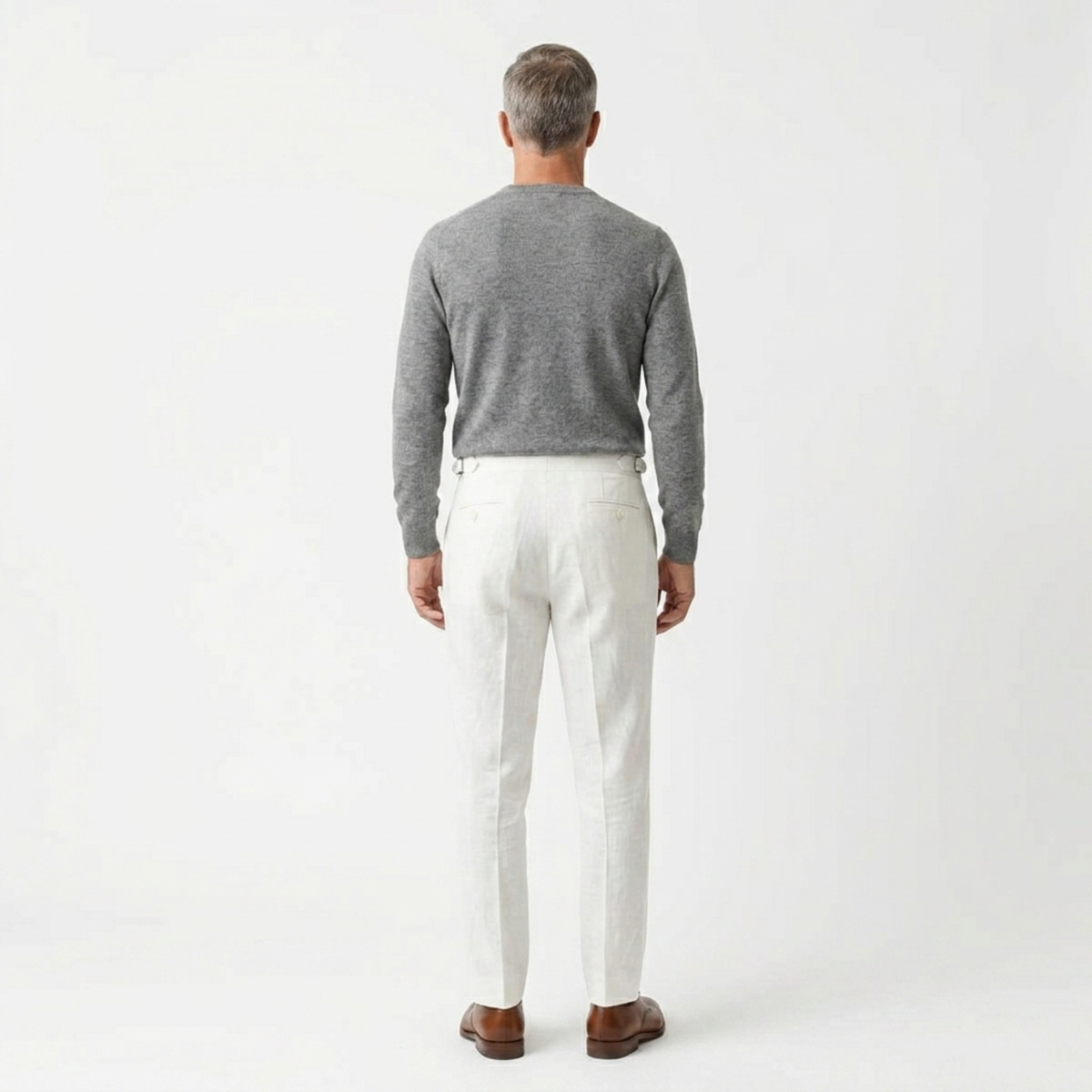 Men's tailored linen trousers with double pleats and turn-up cuffs in beige