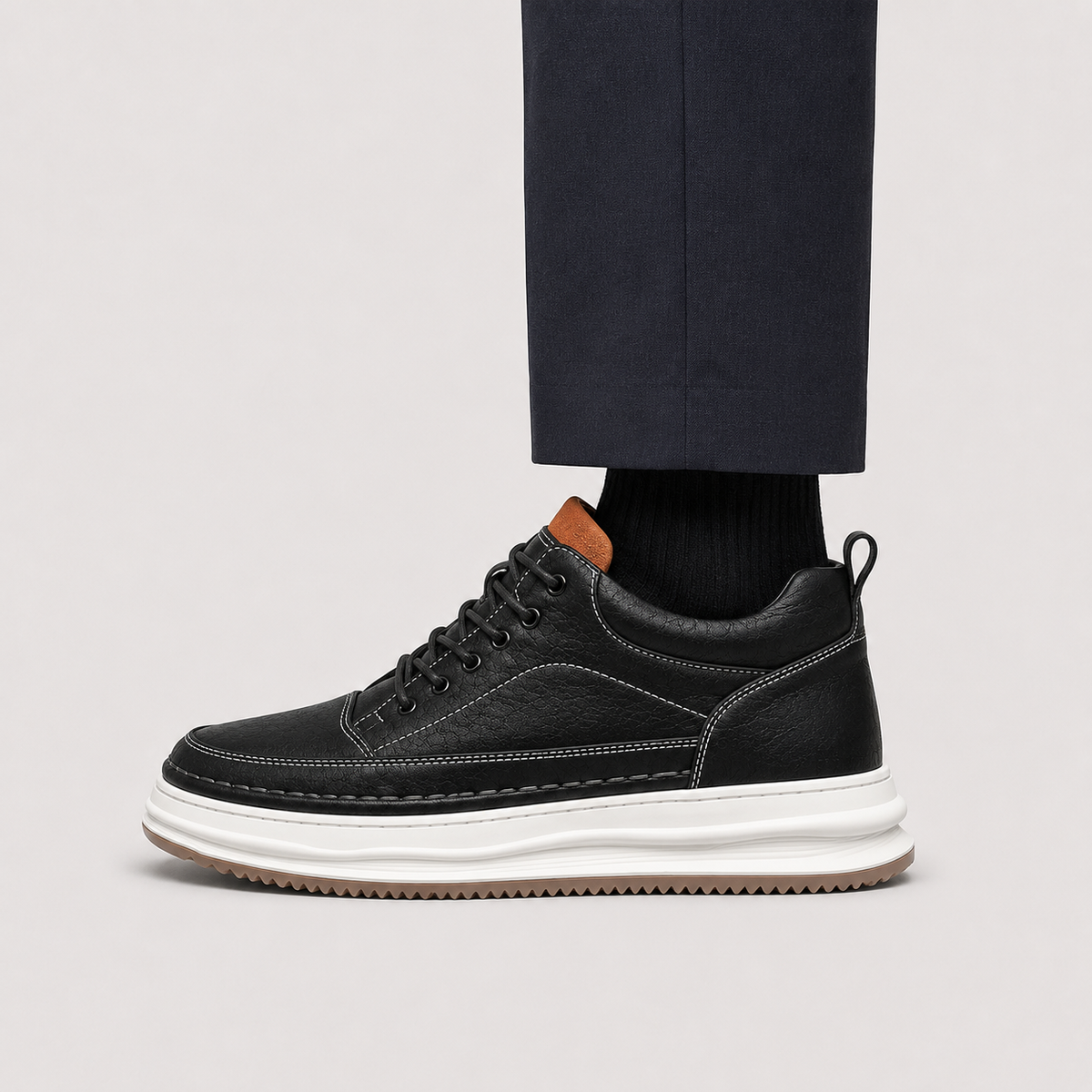Men's leather look low-profile sneakers in black and brown