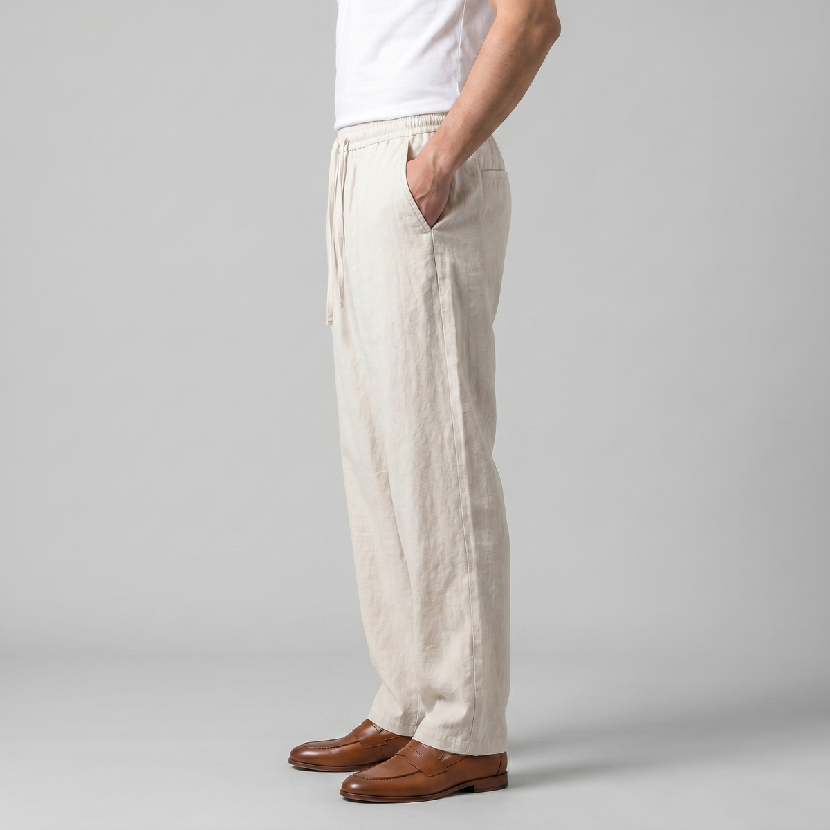 Men's beige baggy linen trousers with loose fit and drawstring waist