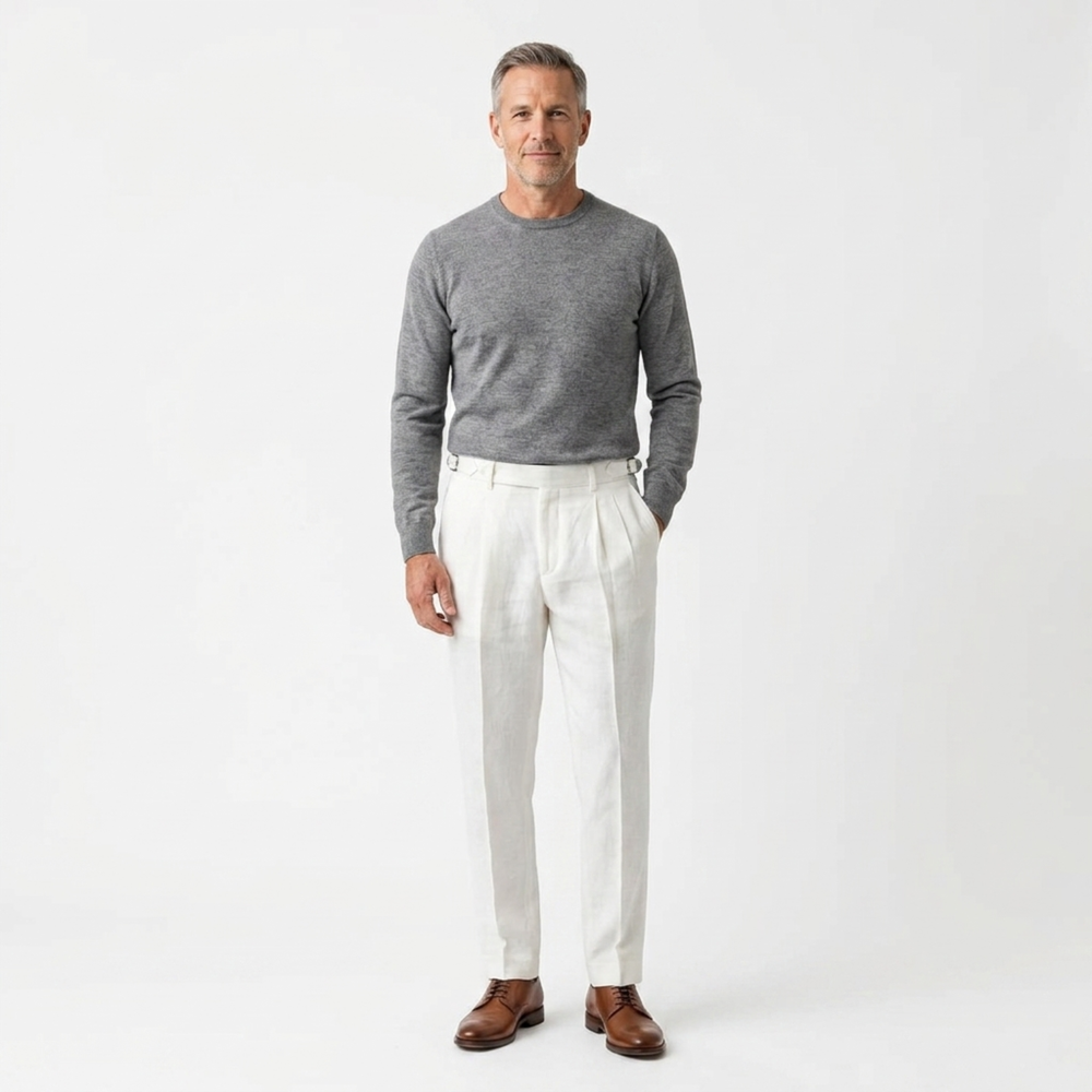 Men's tailored linen trousers with double pleats and turn-up cuffs in beige