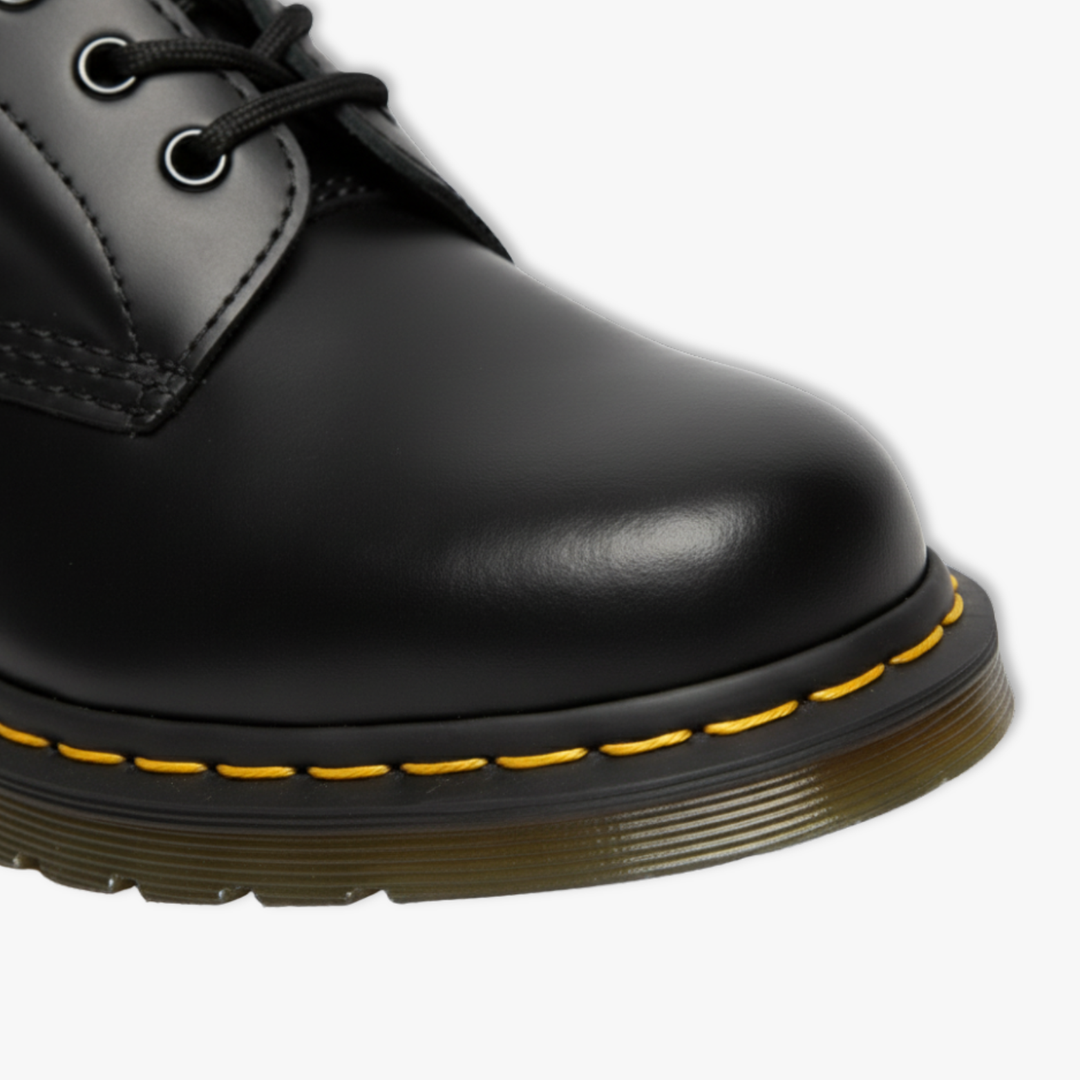 Genuine leather ankle boots with a chunky thick sole in black