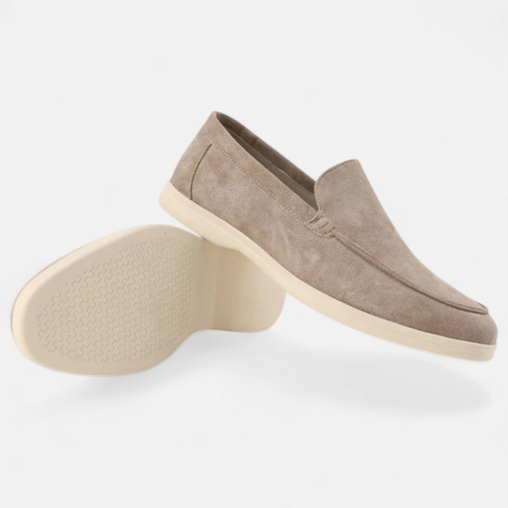 Men's suede penny loafers with classic silhouette and hand-stitched detailing