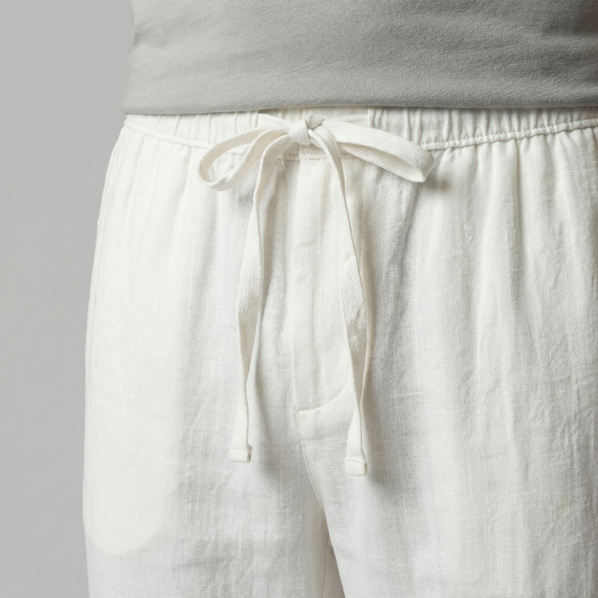 Men's slim fit linen trousers in neutral tones for casual summer wear
