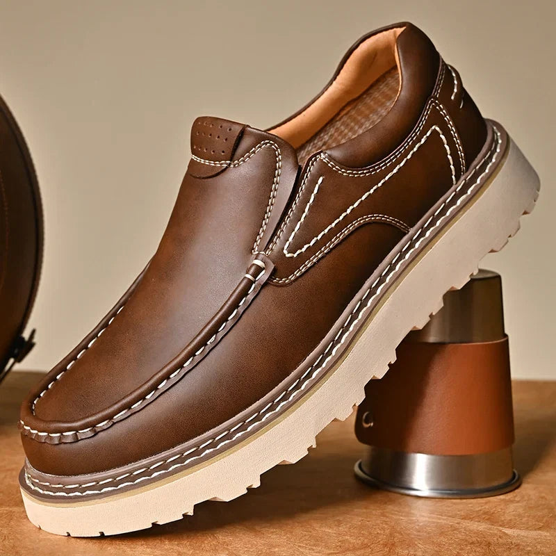 Men's genuine leather slip-on loafers with stitch detailing and rubber outsole