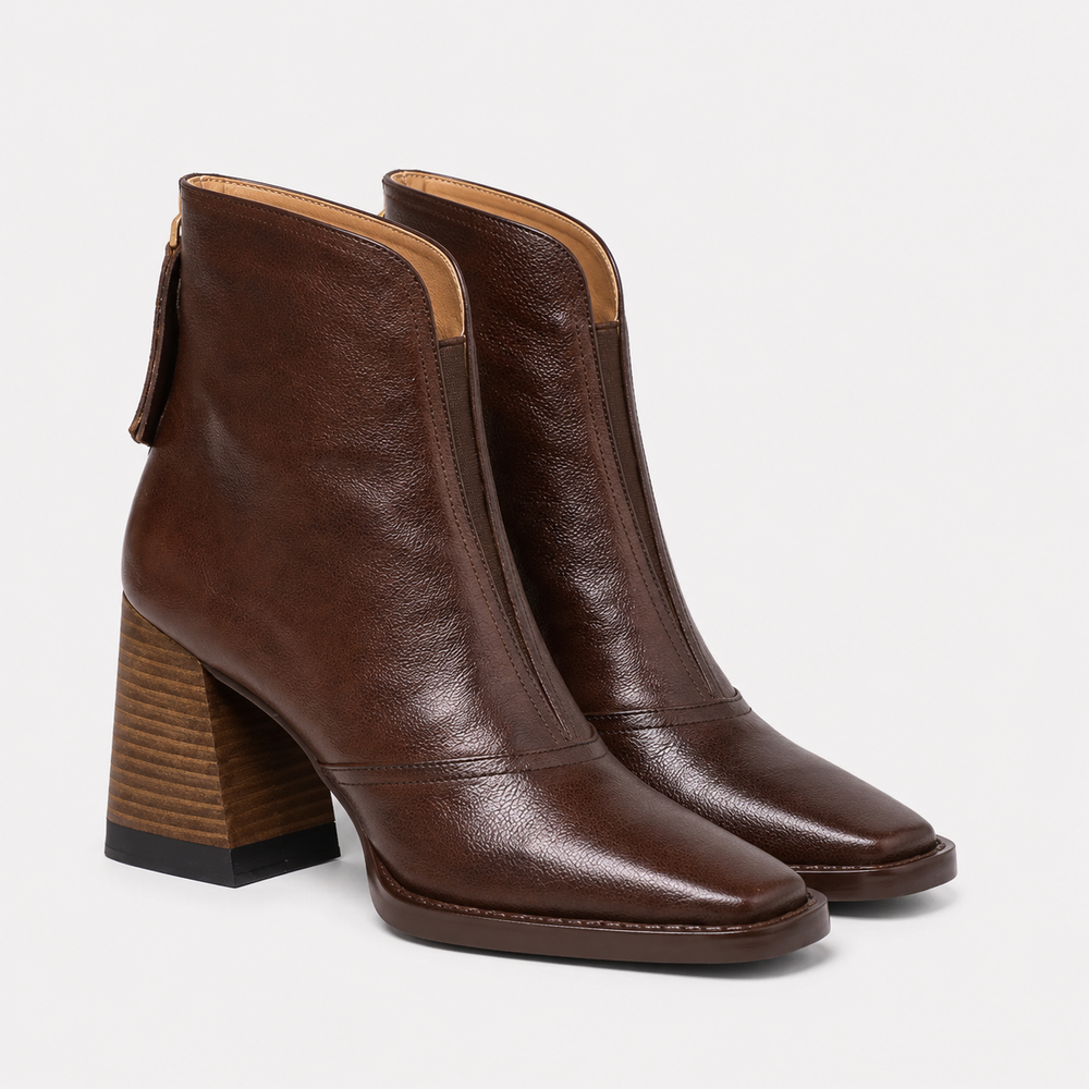 Women's leather-look slip-on ankle boots in black and brown