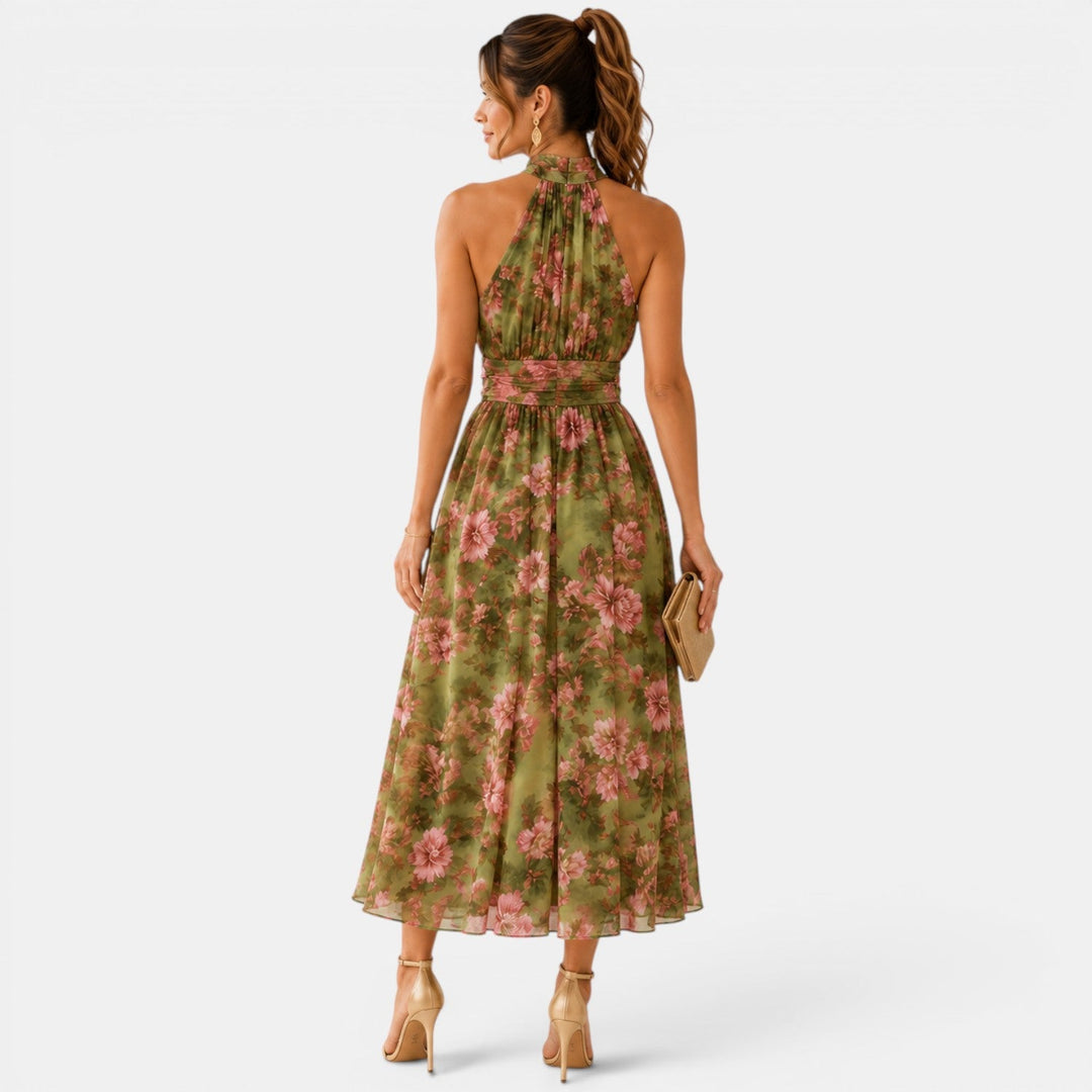 Green floral halter neck maxi dress with flowing skirt