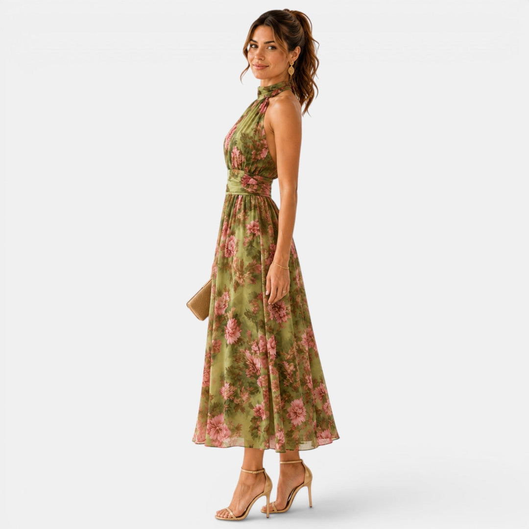 Green floral halter neck maxi dress with flowing skirt