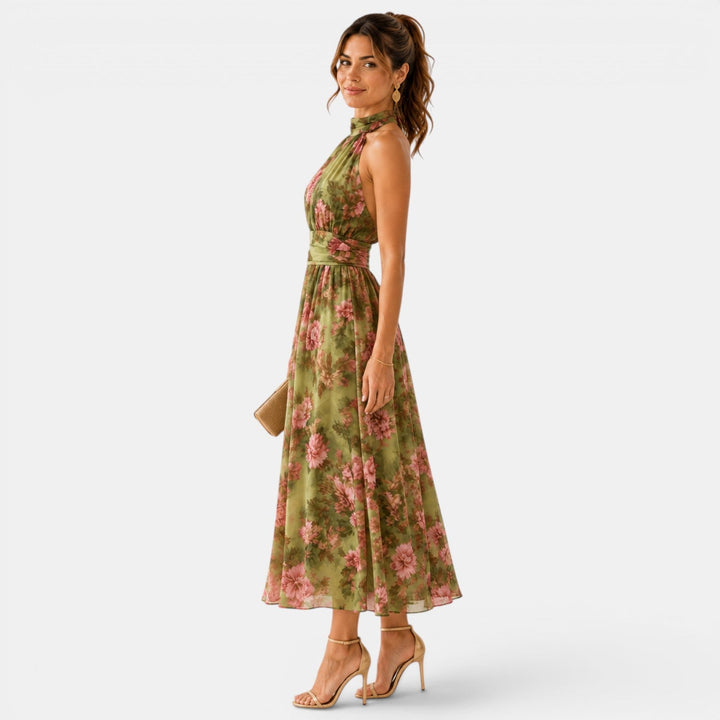 Green floral halter neck maxi dress with flowing skirt
