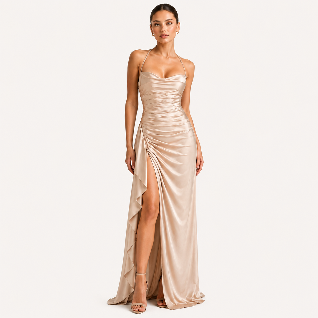 Draped sleeveless satin maxi dress with side slit in an elegant flowing silhouette