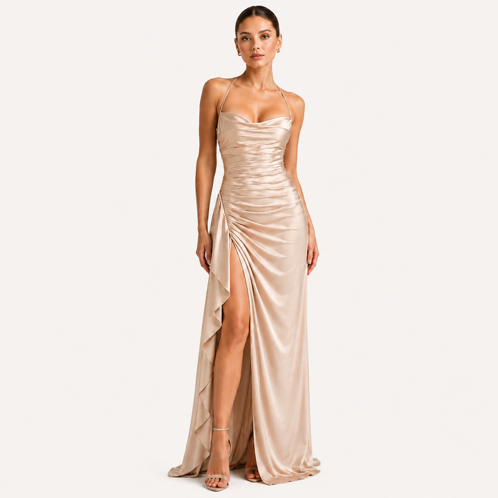 Draped sleeveless satin maxi dress with side slit in an elegant flowing silhouette