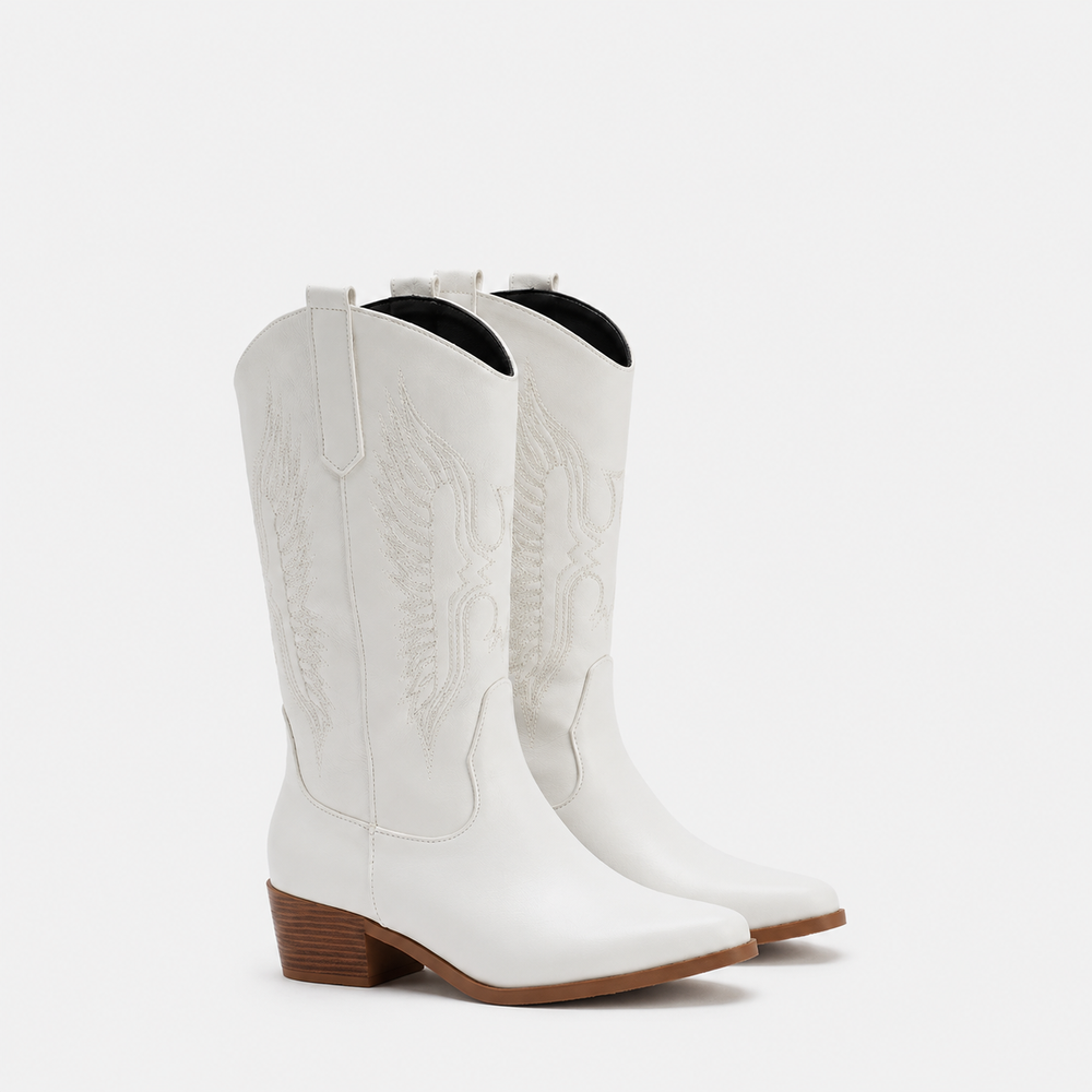 Women's leather cowboy boots in Western style, shown in white, black, and brown
