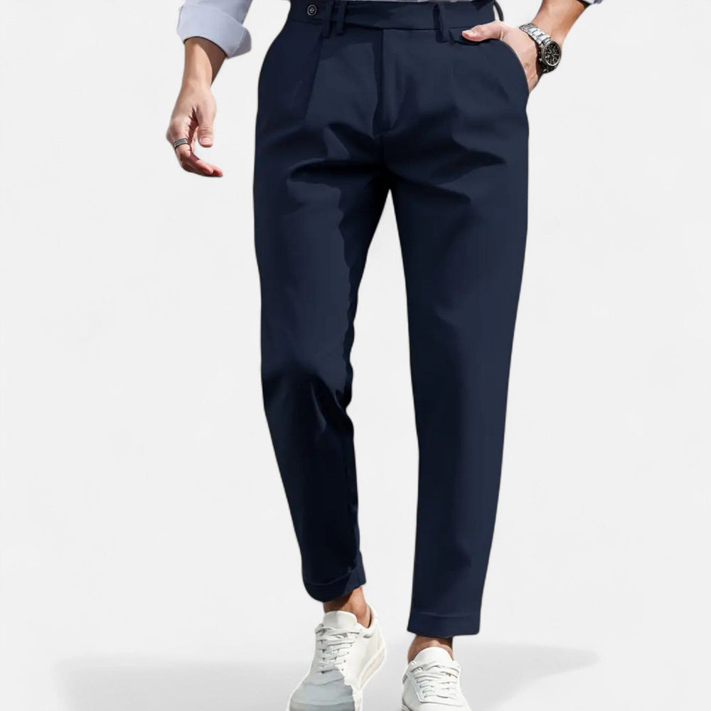 Men's slim-fit pleated suit trousers shown in a tailored dress-pant silhouette