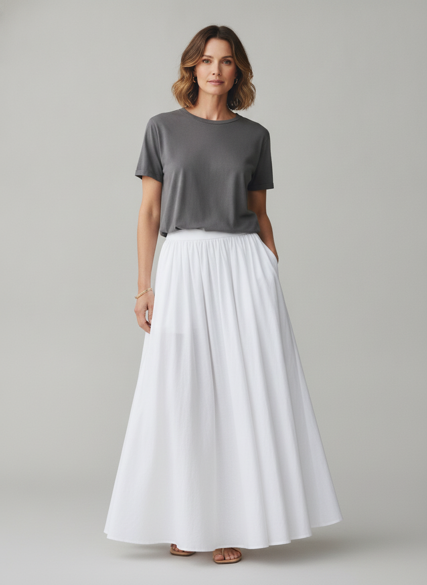 Vrouw draagt witte linnen maxi-rok