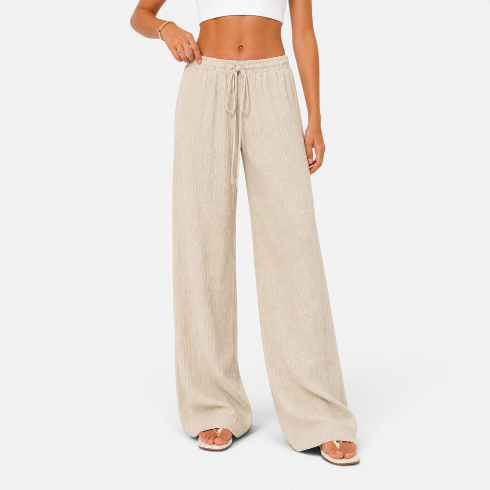 Women's wide-leg drawstring trousers with a relaxed, flowing silhouette